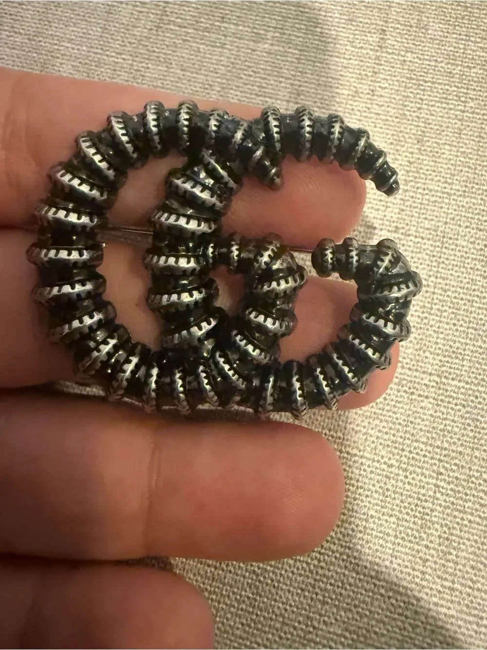 New with box Gucci gun metal color gg brooch